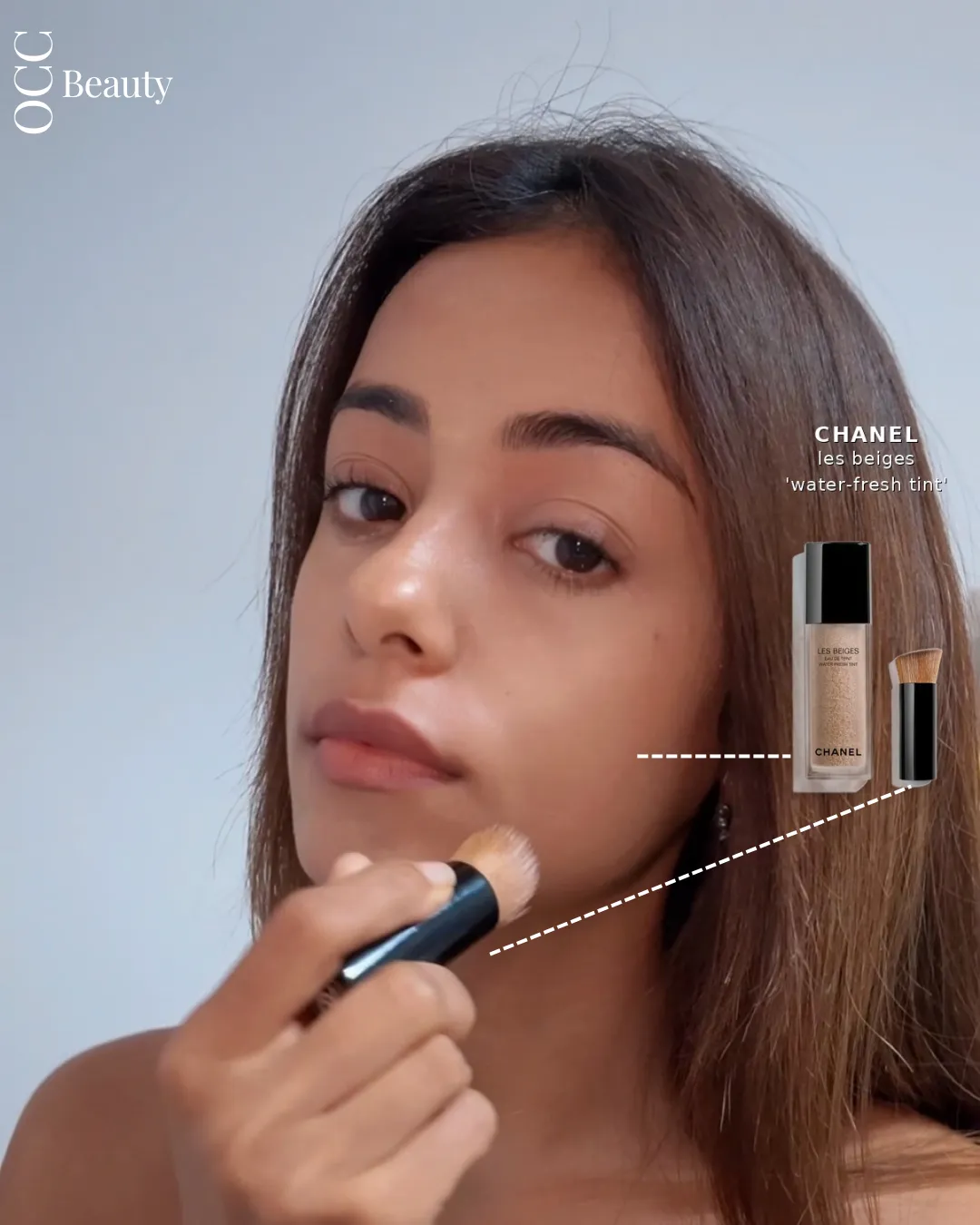 OCC Beauty cover: a fresh, even complexion mid-application, a fluffy brush sweeping Chanel Les Beiges Water-Fresh Tint along the cheek, the bottle called out at the side.